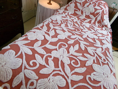 boho floral chenille bedspread, white climbing showy flowers on rusty terracotta vintage hippie 1970s style bedding