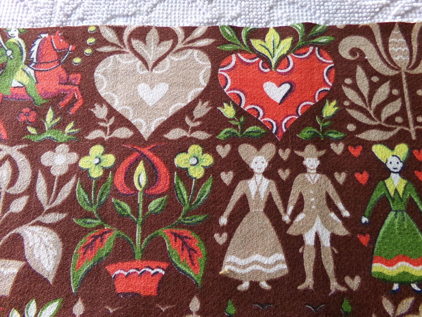 vintage barkcloth fabric in dutch country colonial style shadow print with people, hearts, birds, apple trees, houses, 16" x 22" inch piece